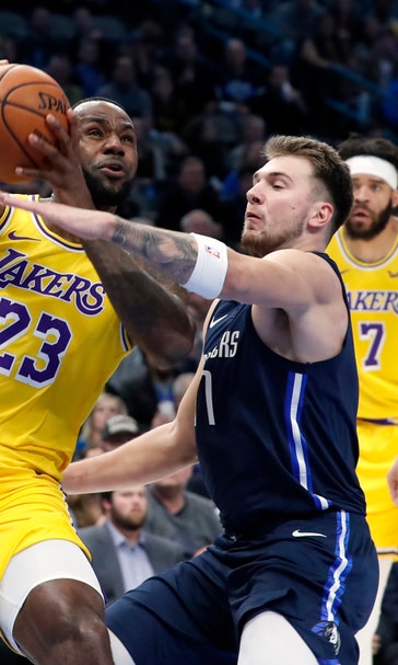 LeBron James has triple-double, Lakers beat Mavs in OT